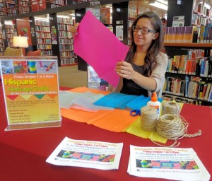 Jennifer Abarca, a social work intern from Fredonia, works on one of the crafts to be taught at 3:30 p.m. Friday, Oct. 7 at Prendergast Library, 509 Cherry St., Jamestown. Those attending will learn to make papel picado, Mexican folk art, Chilean rain sticks and a Puerto Rican guiro in recognition of National Hispanic Heritage Month. The event is geared toward children and teens, but all ages are welcome.